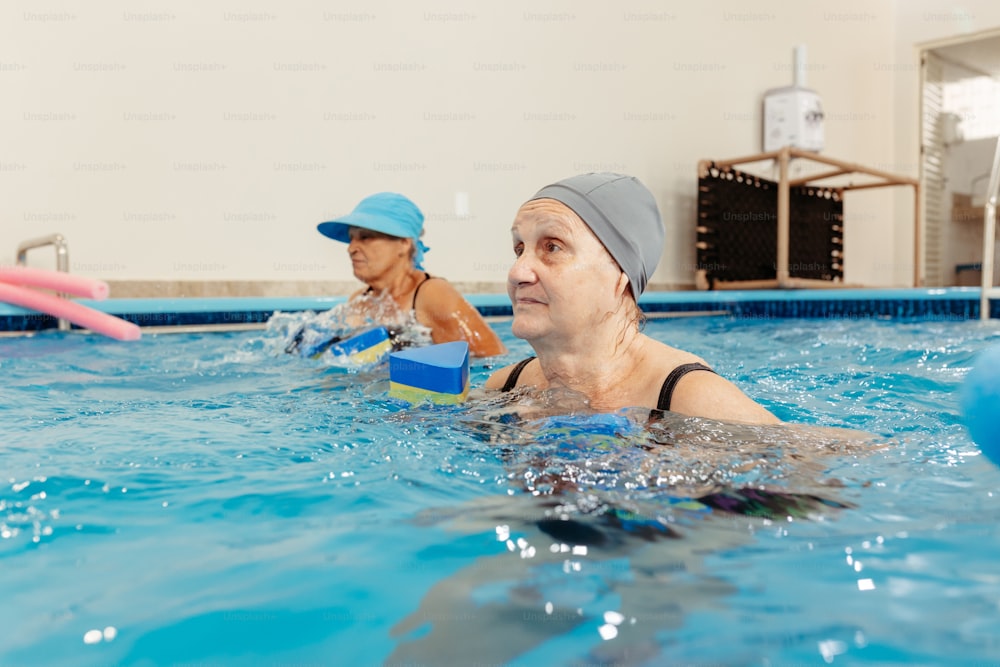 a group of people in a swimming pool