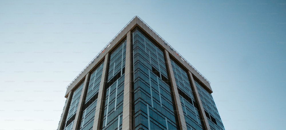 a tall building with a clock on the top of it