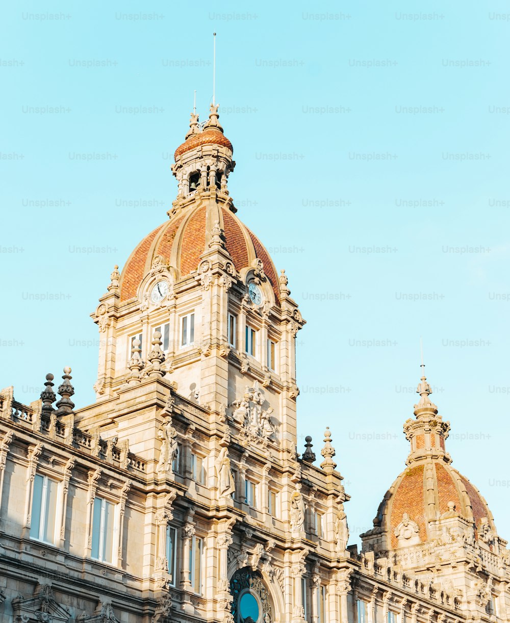 a large building with a clock on the top of it