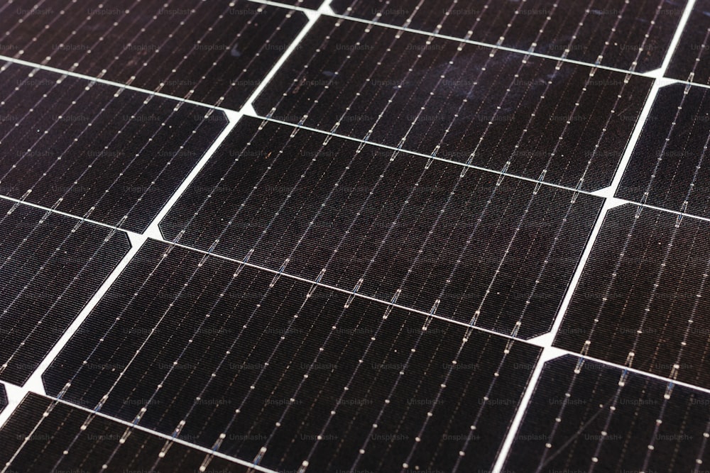 a close up of a black and white photo of a solar panel