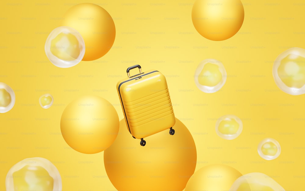 uma mala amarela sentada em cima de bolhas