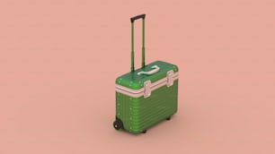 Una pieza de equipaje verde sobre un fondo rosa