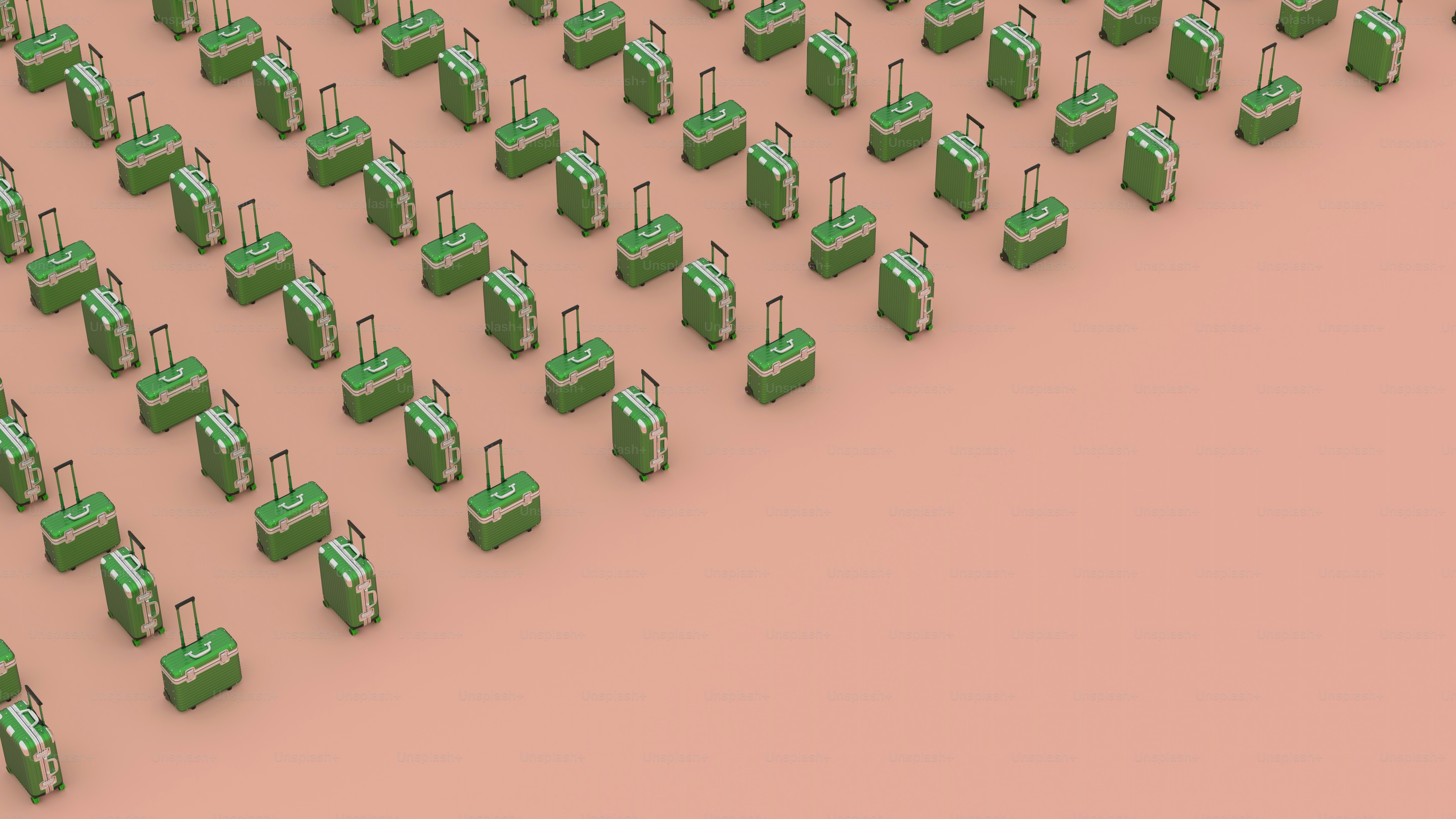 a large group of green suitcases sitting next to each other