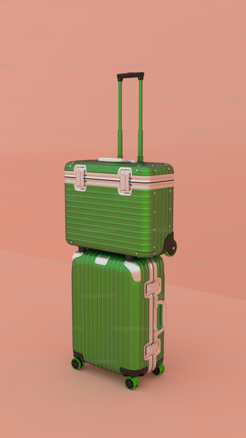 two green suitcases stacked on top of each other