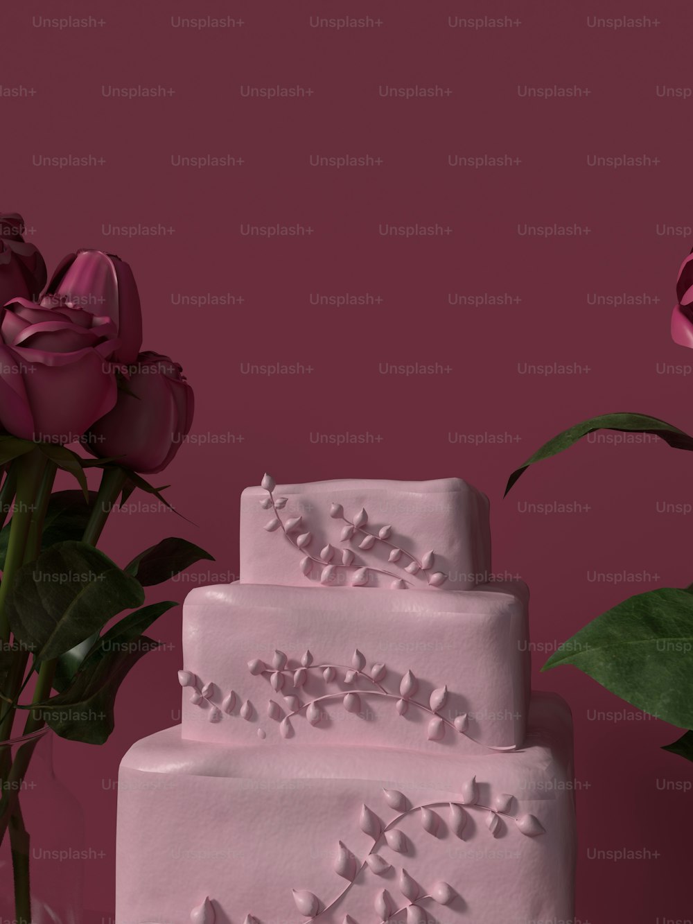 花束の隣に座っている3段のケーキ