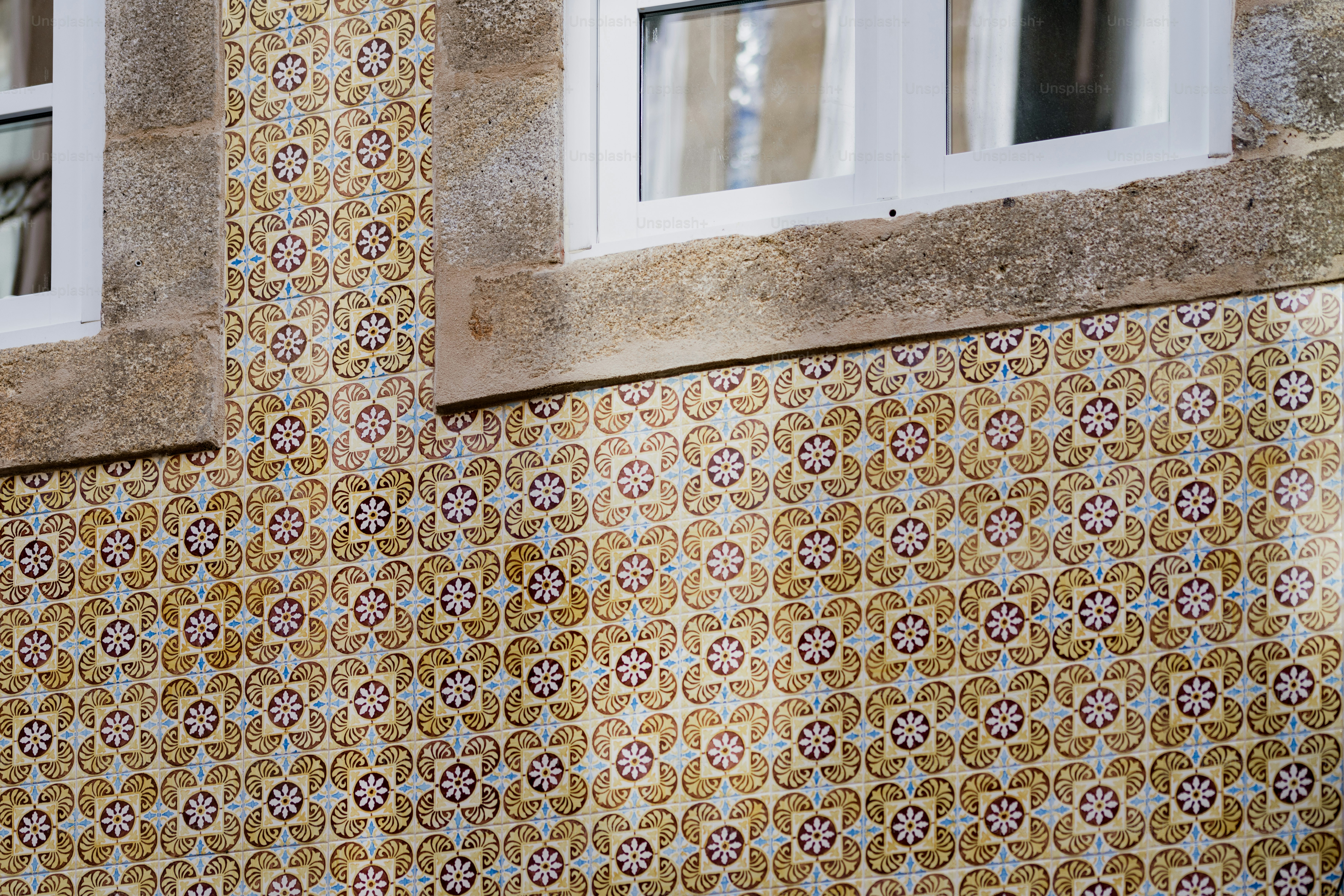 a close up of a wall with a clock on it