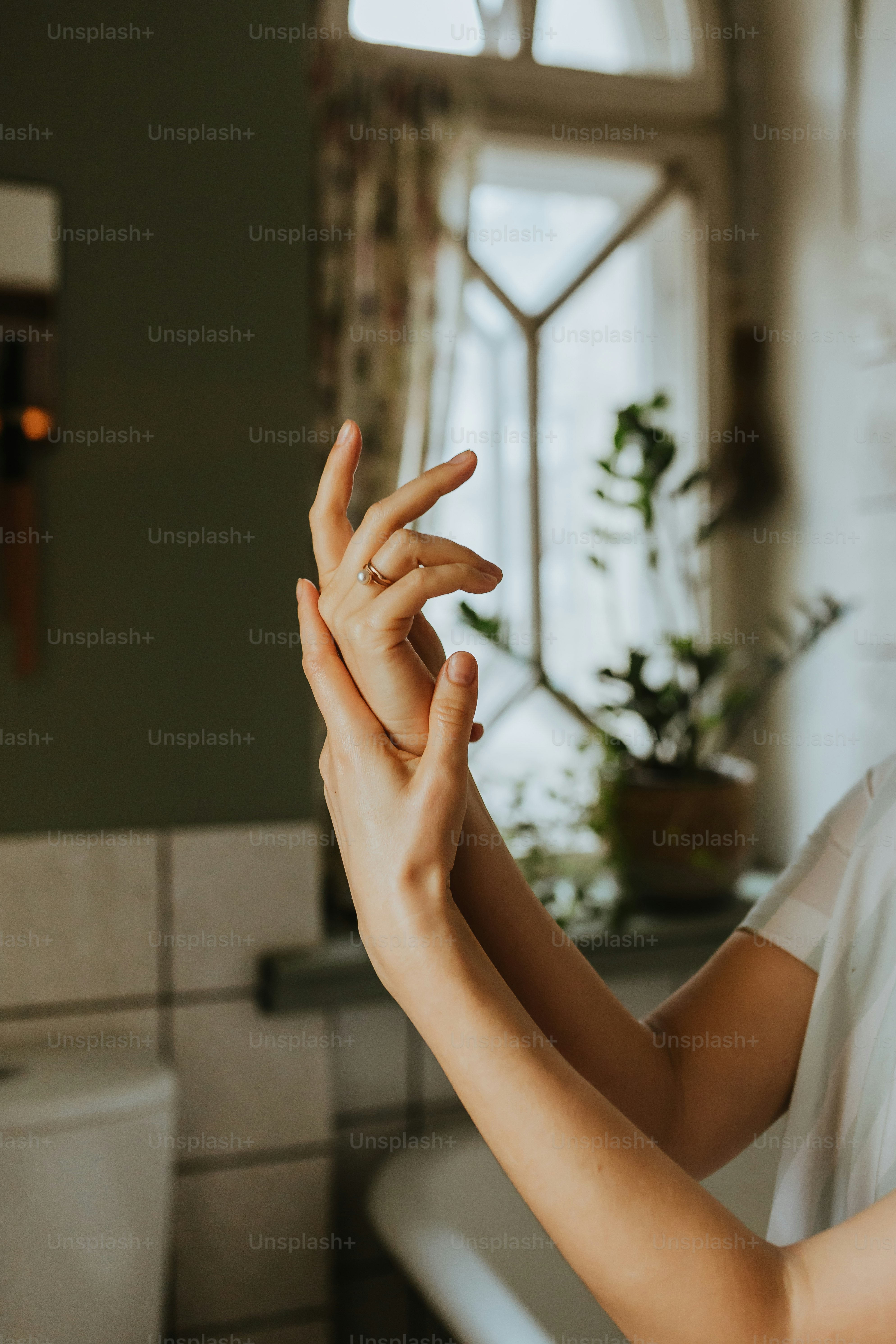 A woman holding her hands up in the air photo – Beauty Image on Unsplash