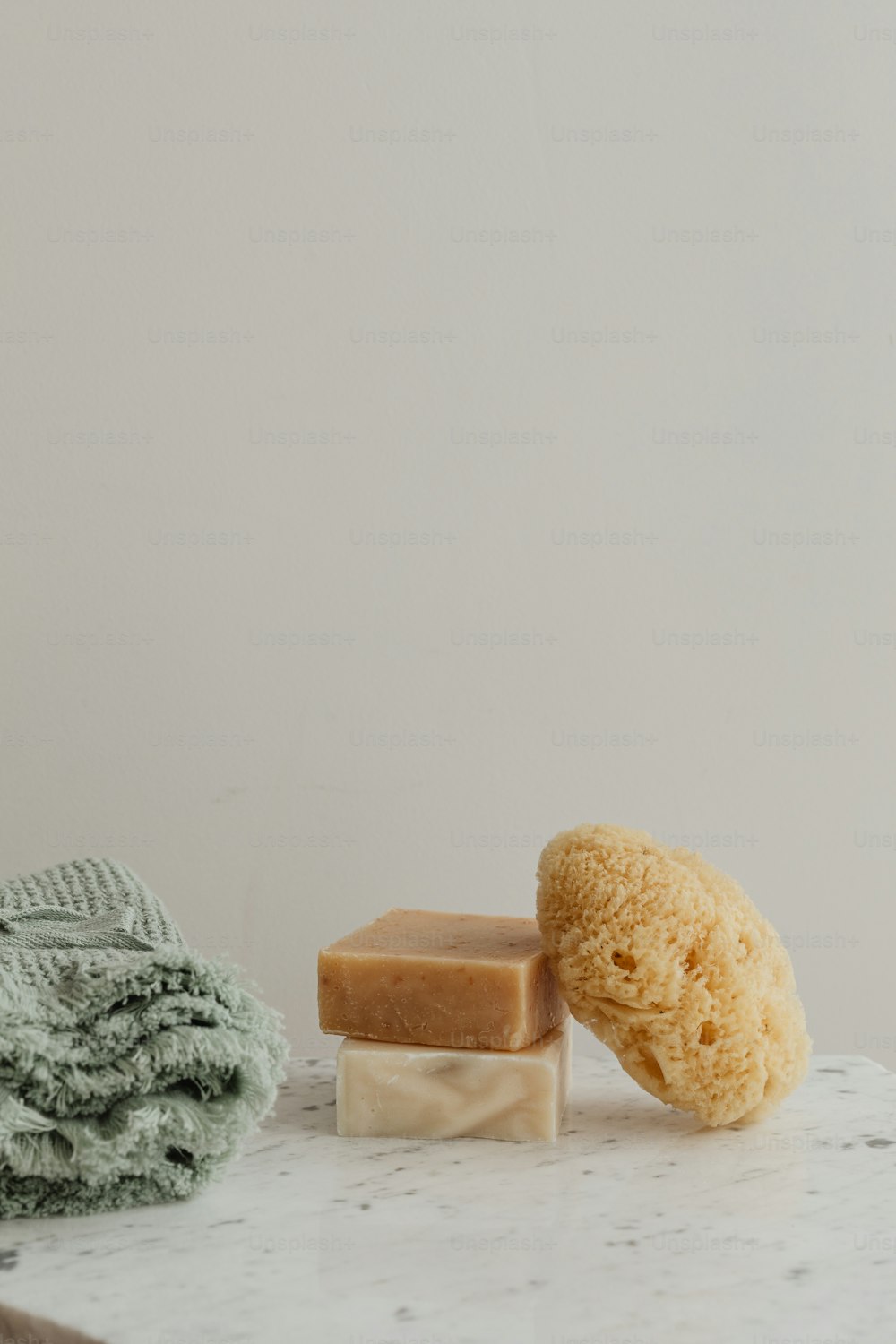 a couple of soaps sitting on top of a counter