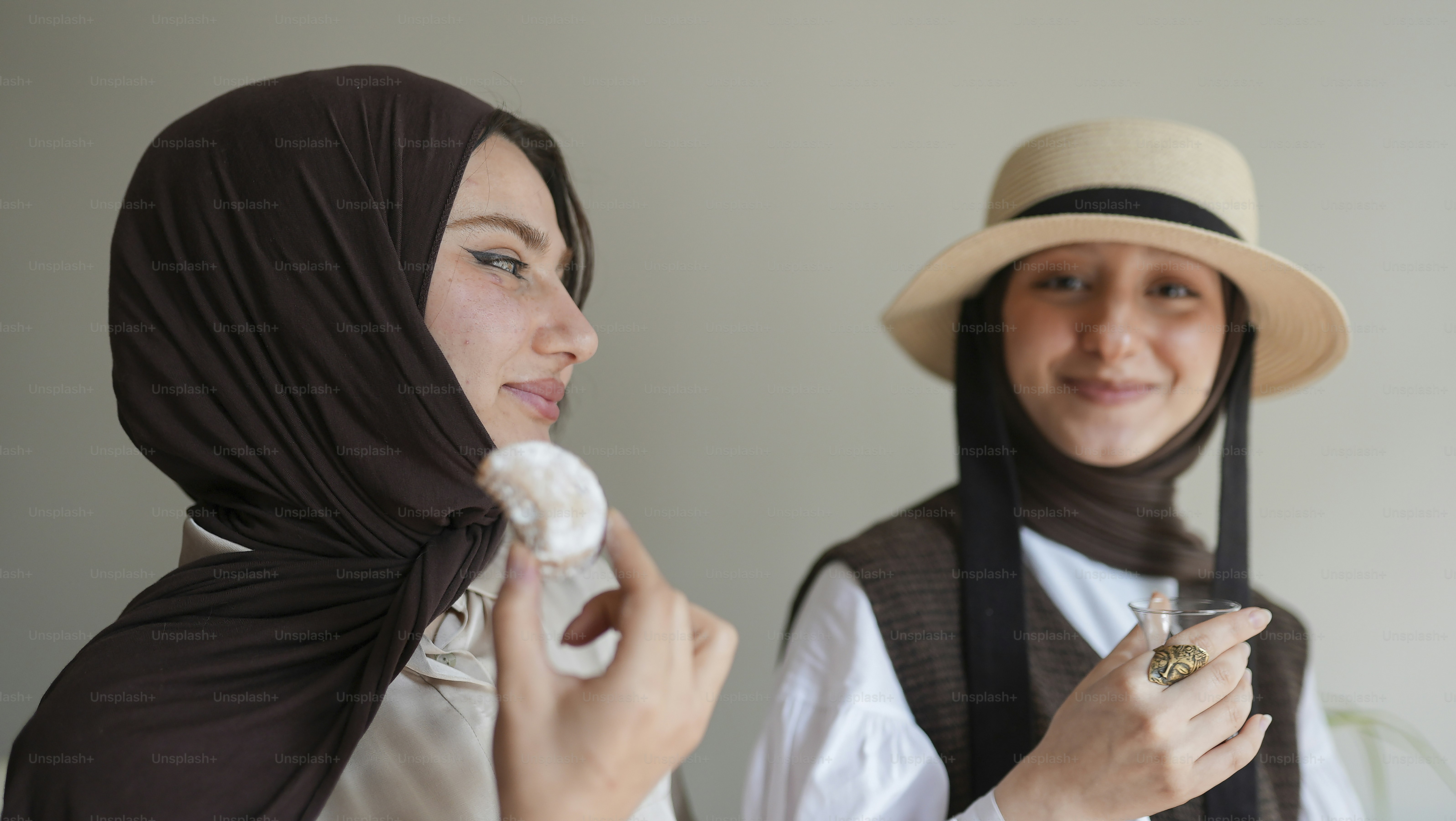 a couple of women standing next to each other