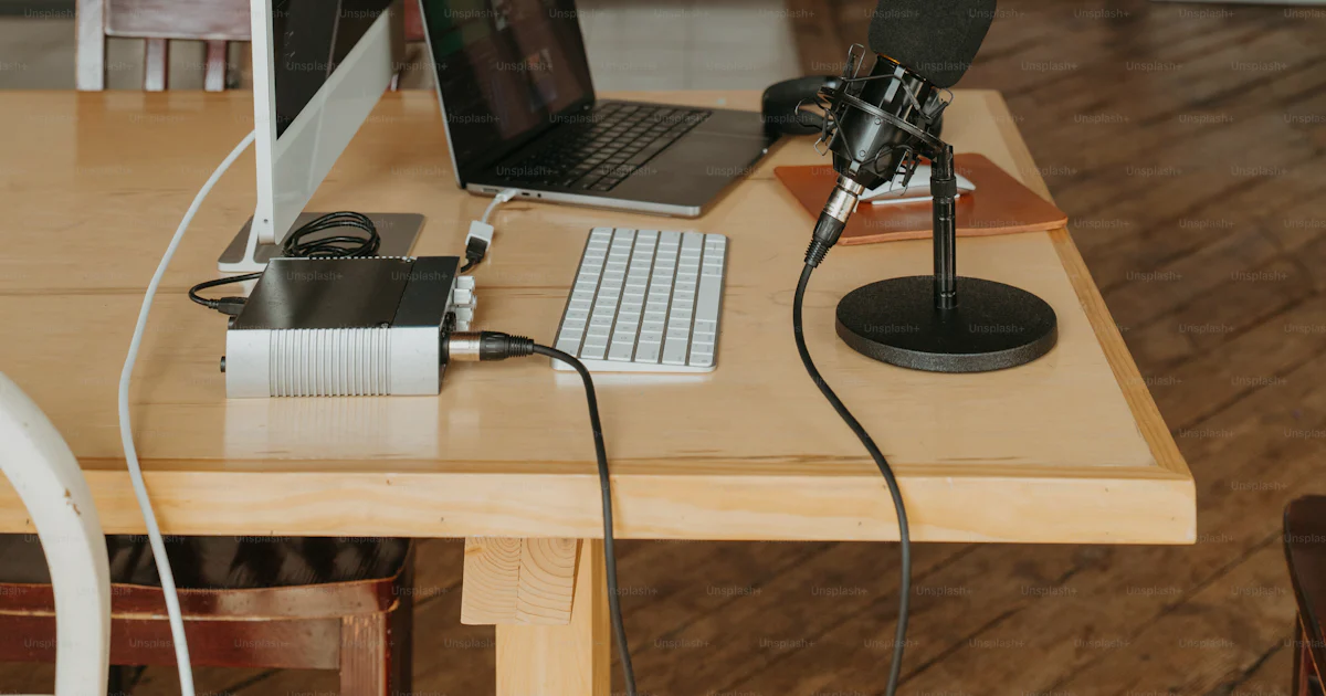 Computer Below The Table A laptop computer sitting on top of a wooden table photo – Technology ...