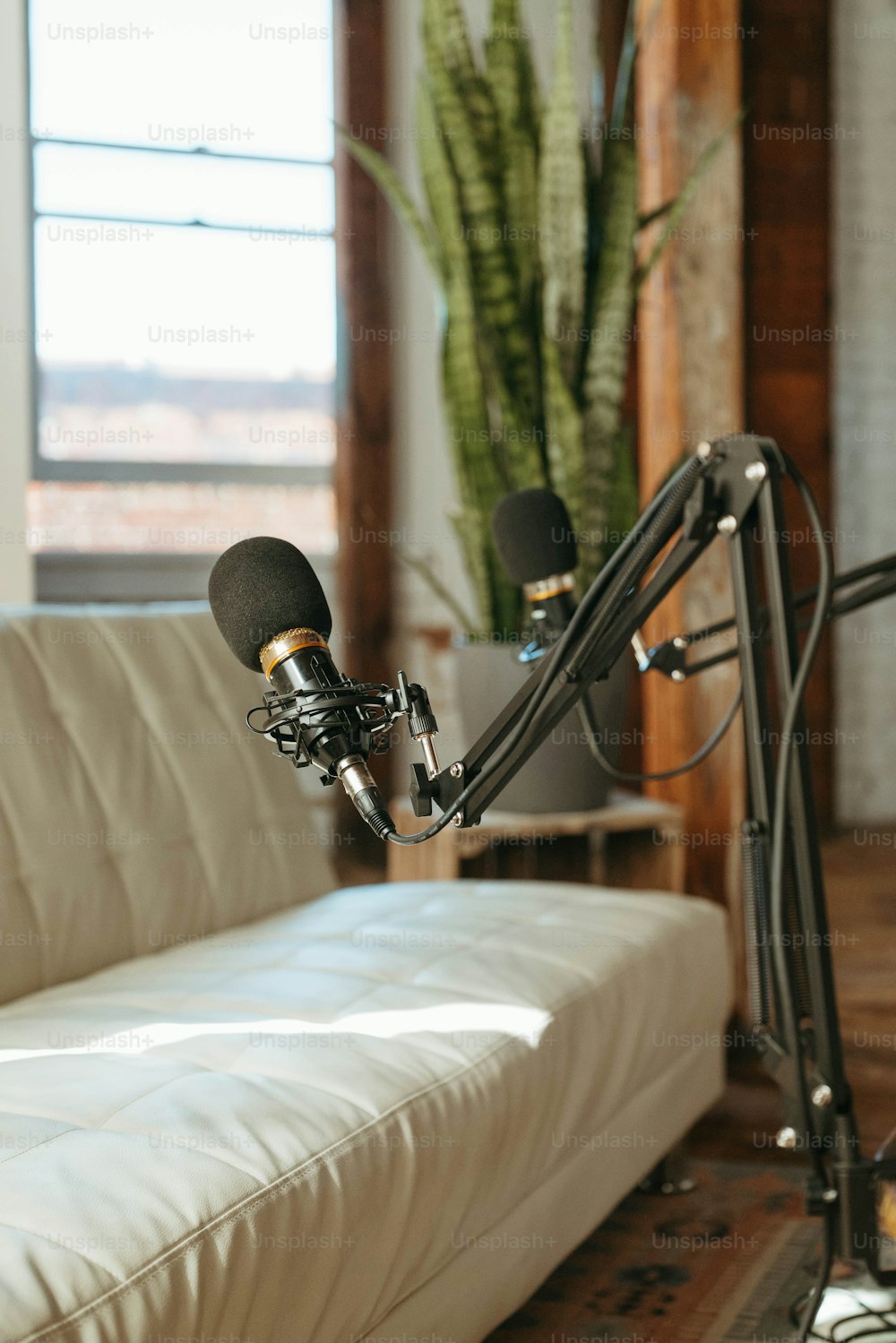 a couch with a microphone attached to it