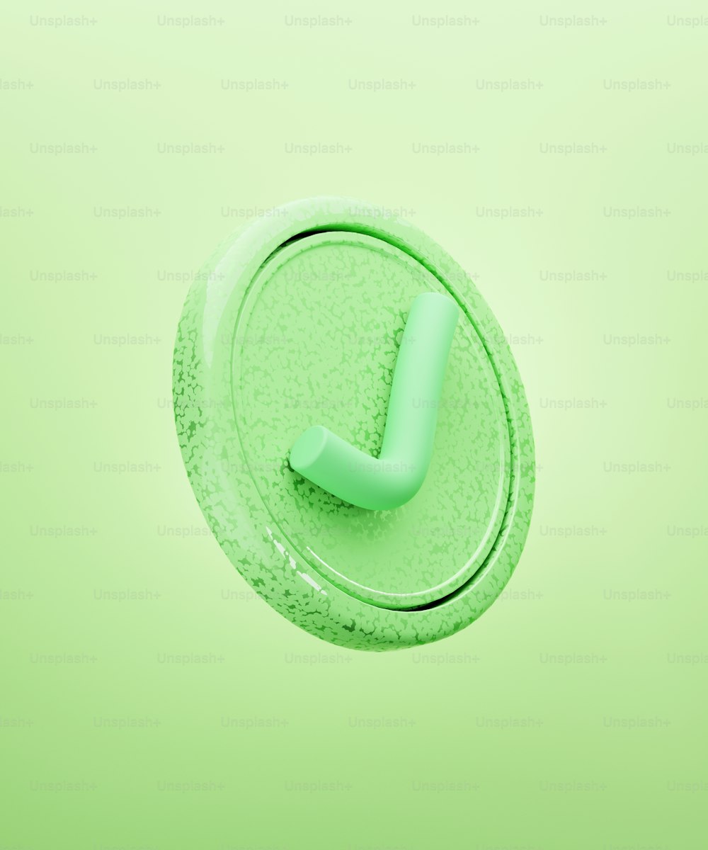Un botón verde con la letra j