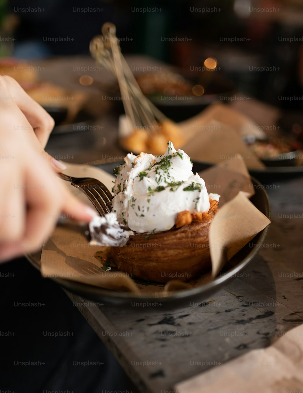 a plate of food with a fork in it