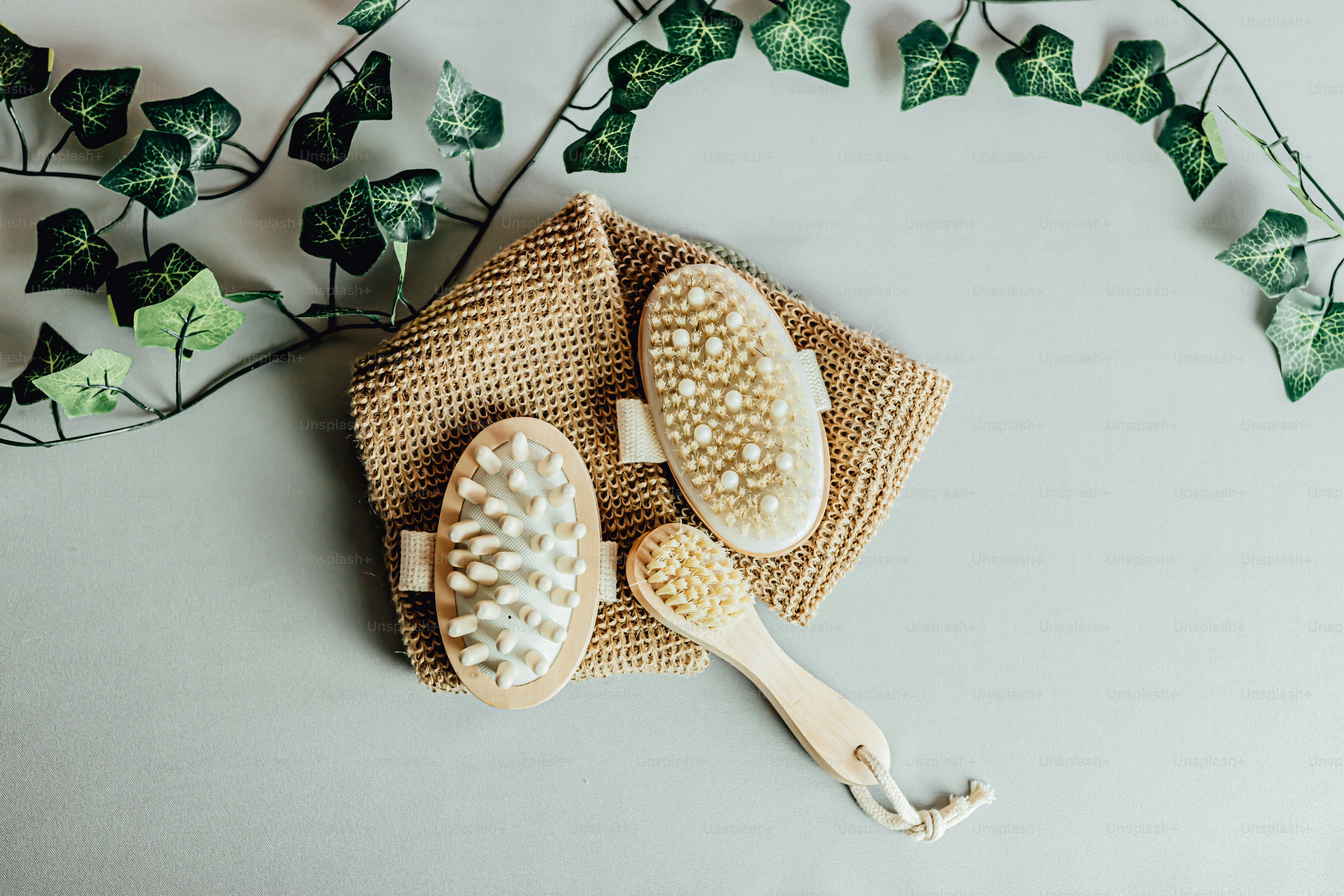 a couple of wooden brushes sitting on top of a table