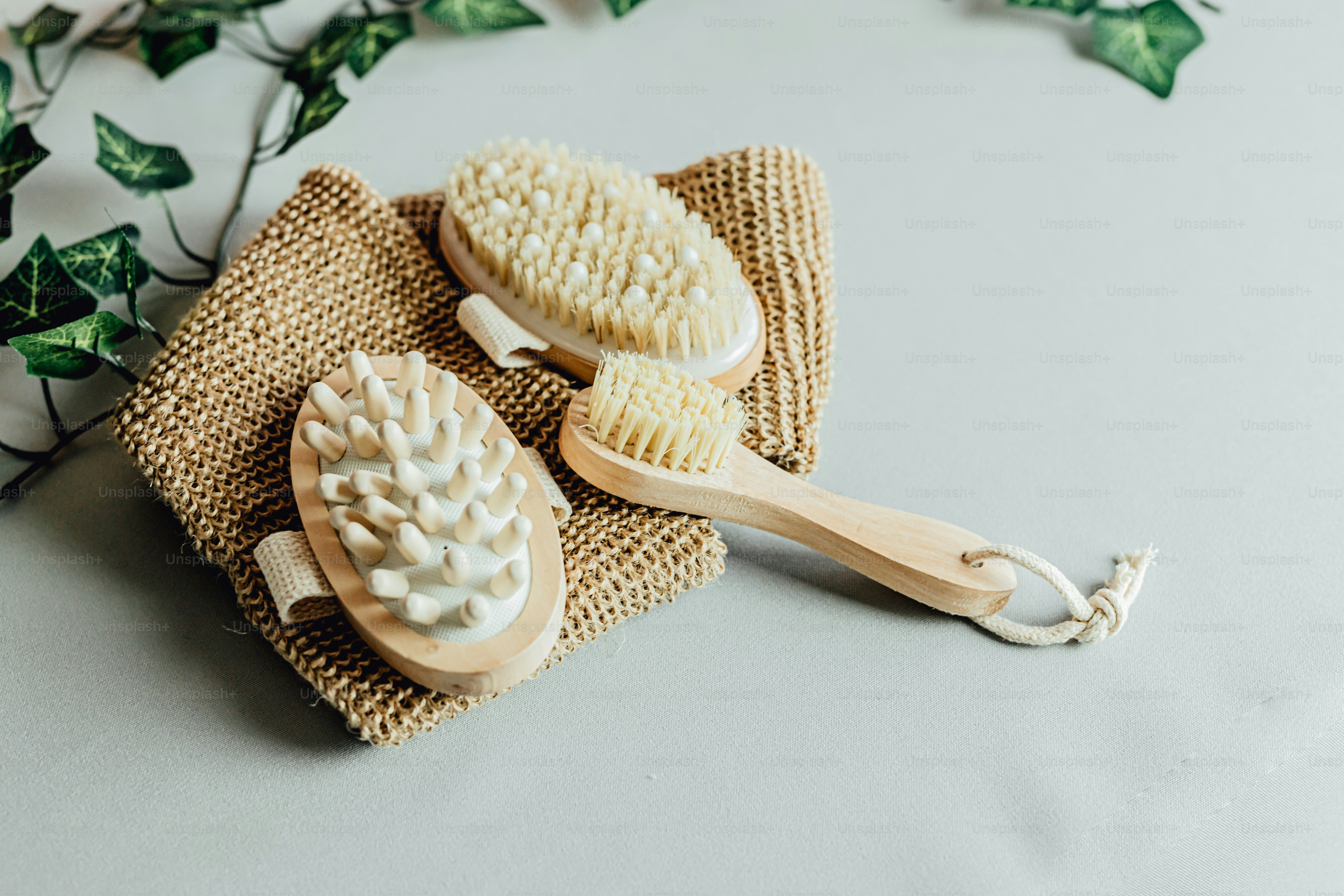 a couple of wooden brushes sitting on top of a table
