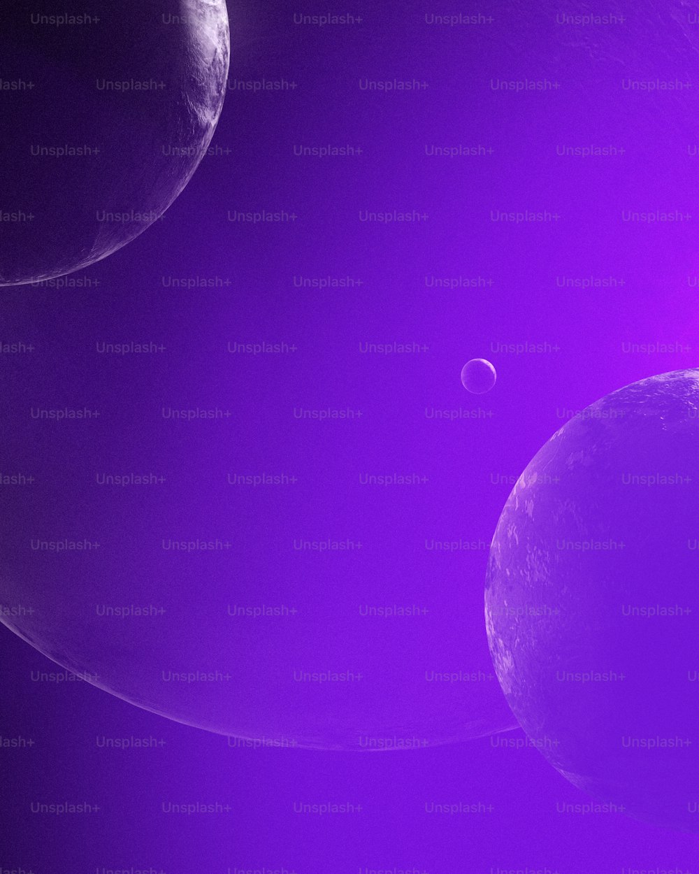a group of planets with a purple background