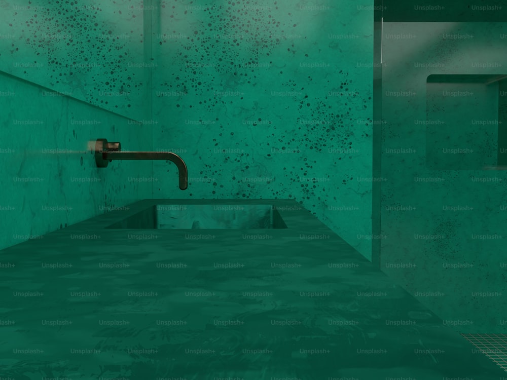 une chambre verte avec un évier et un robinet