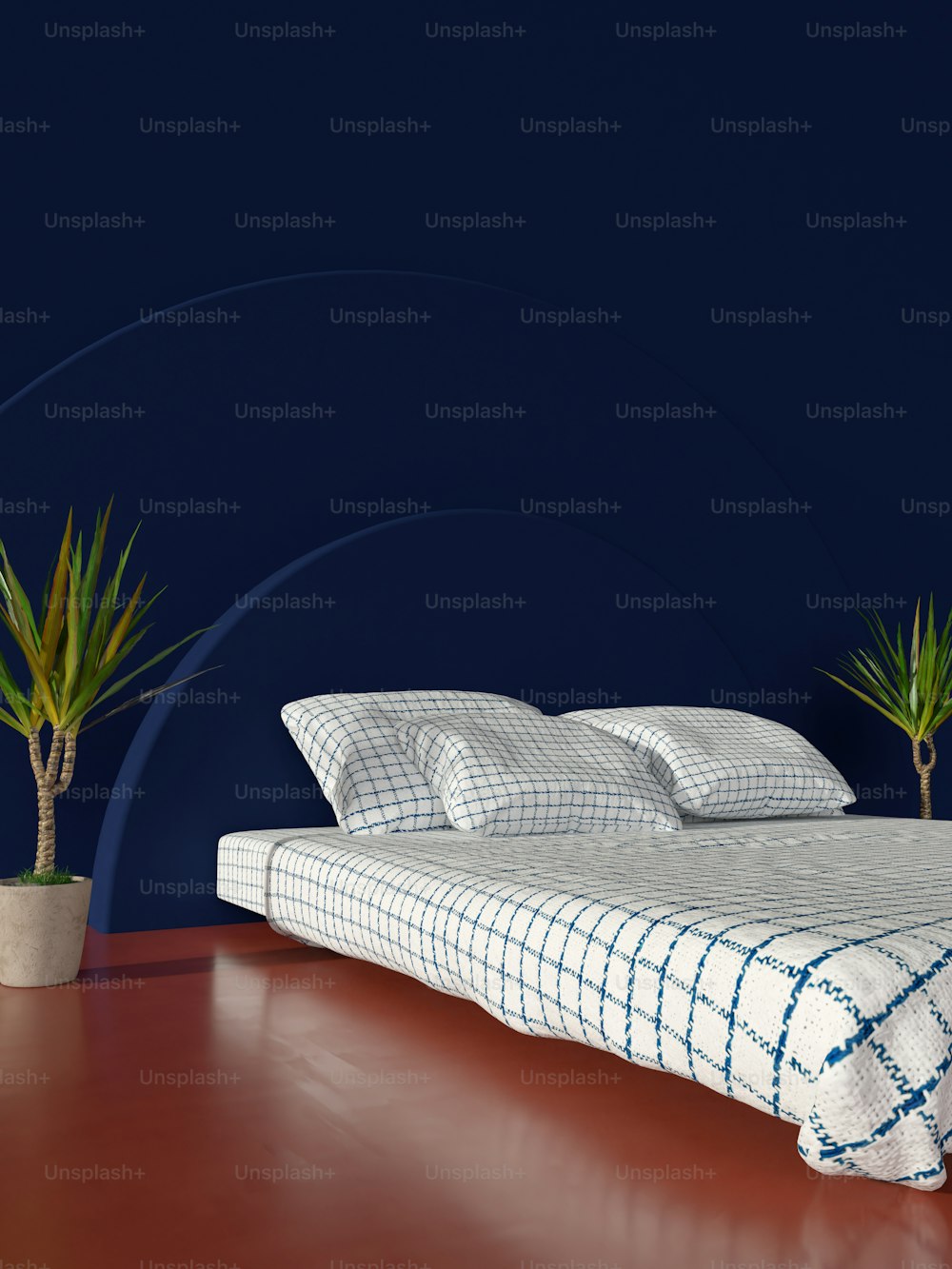 uma cama sentada em um quarto ao lado de um vaso de planta