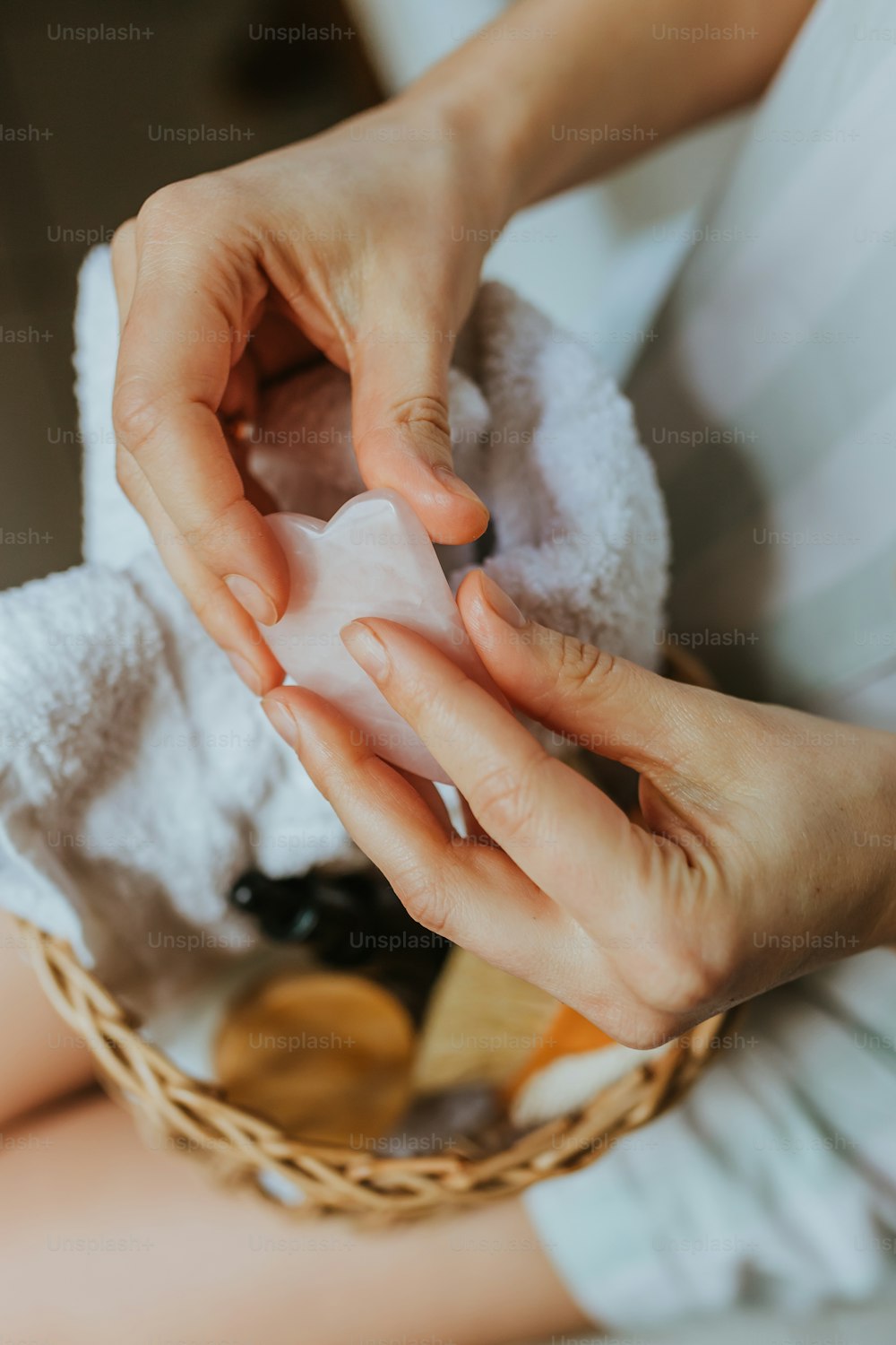 a woman is holding a cloth in her hands