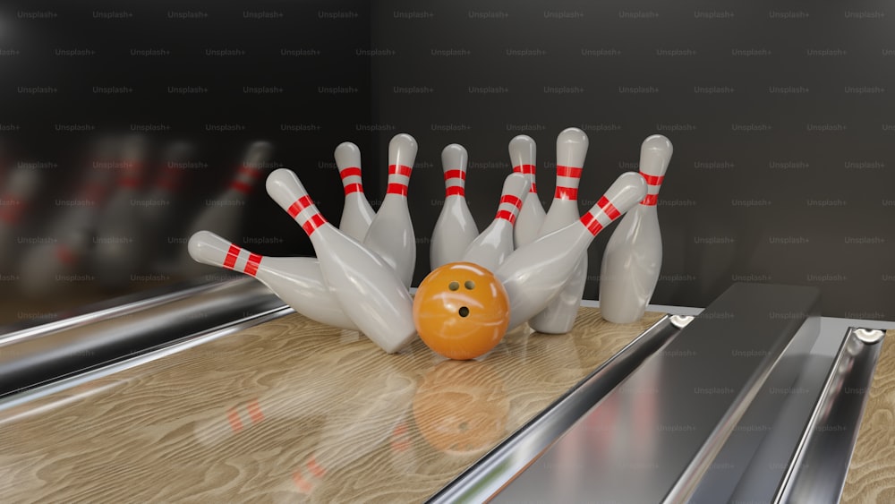 a bowling ball and some bowling pins on a table