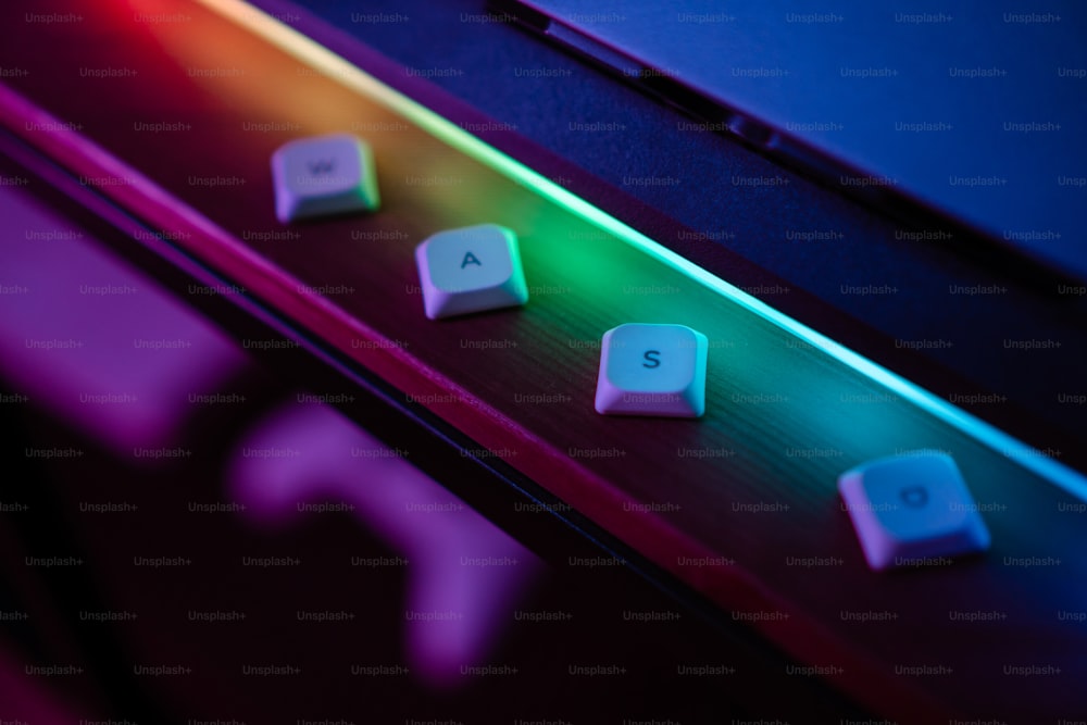 a close up of a keyboard with a light on it