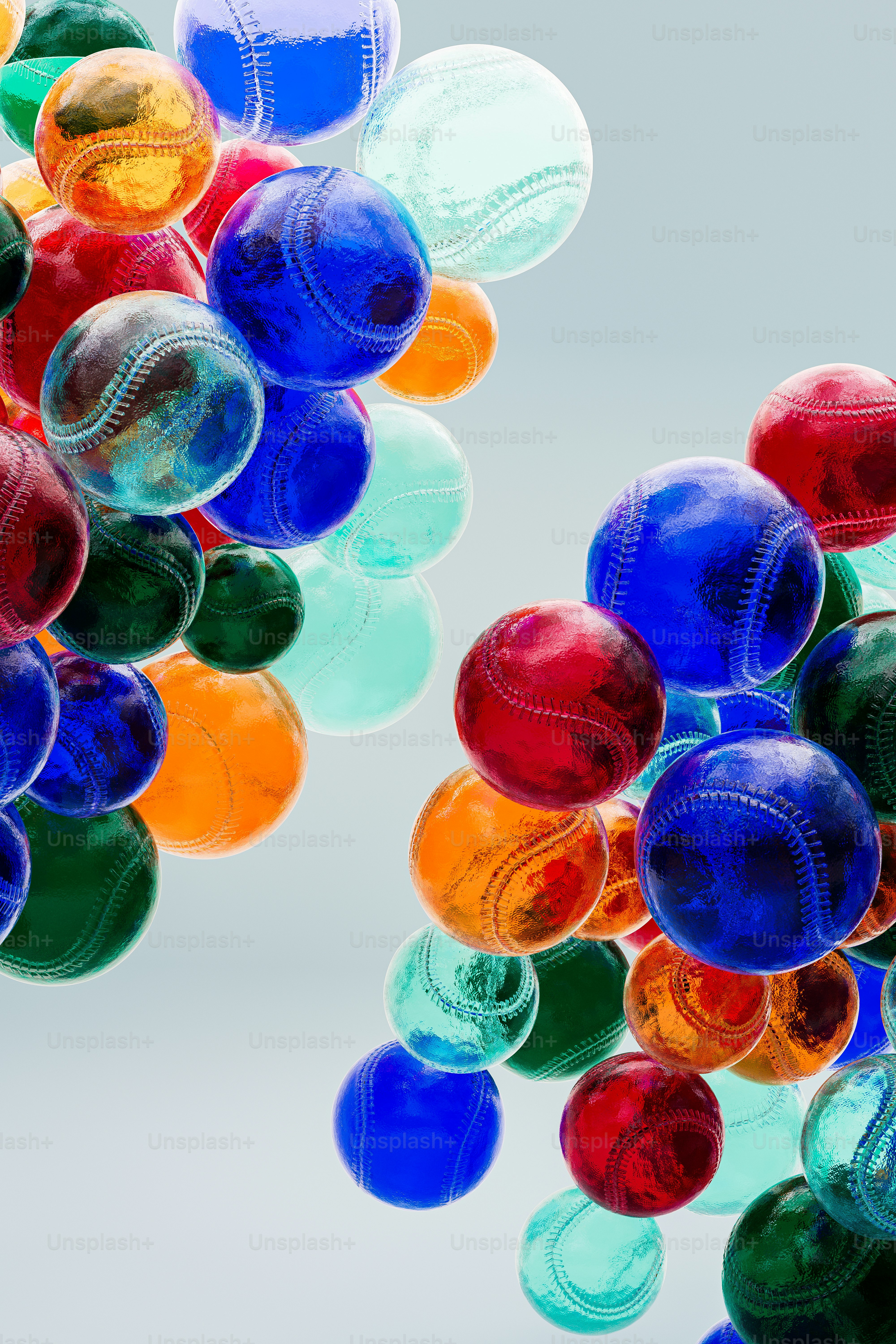 a bunch of colorful balloons floating in the air