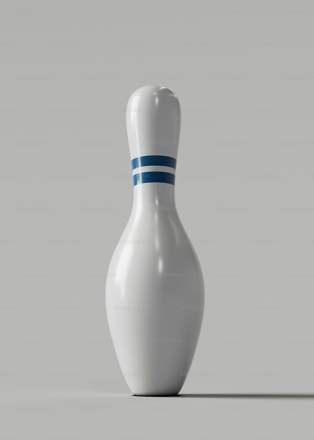 a white bowling ball with a blue stripe on it