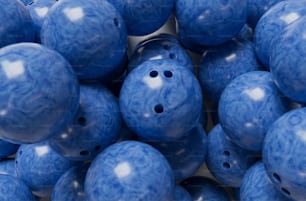 Un montón de bolas azules con agujeros en ellas