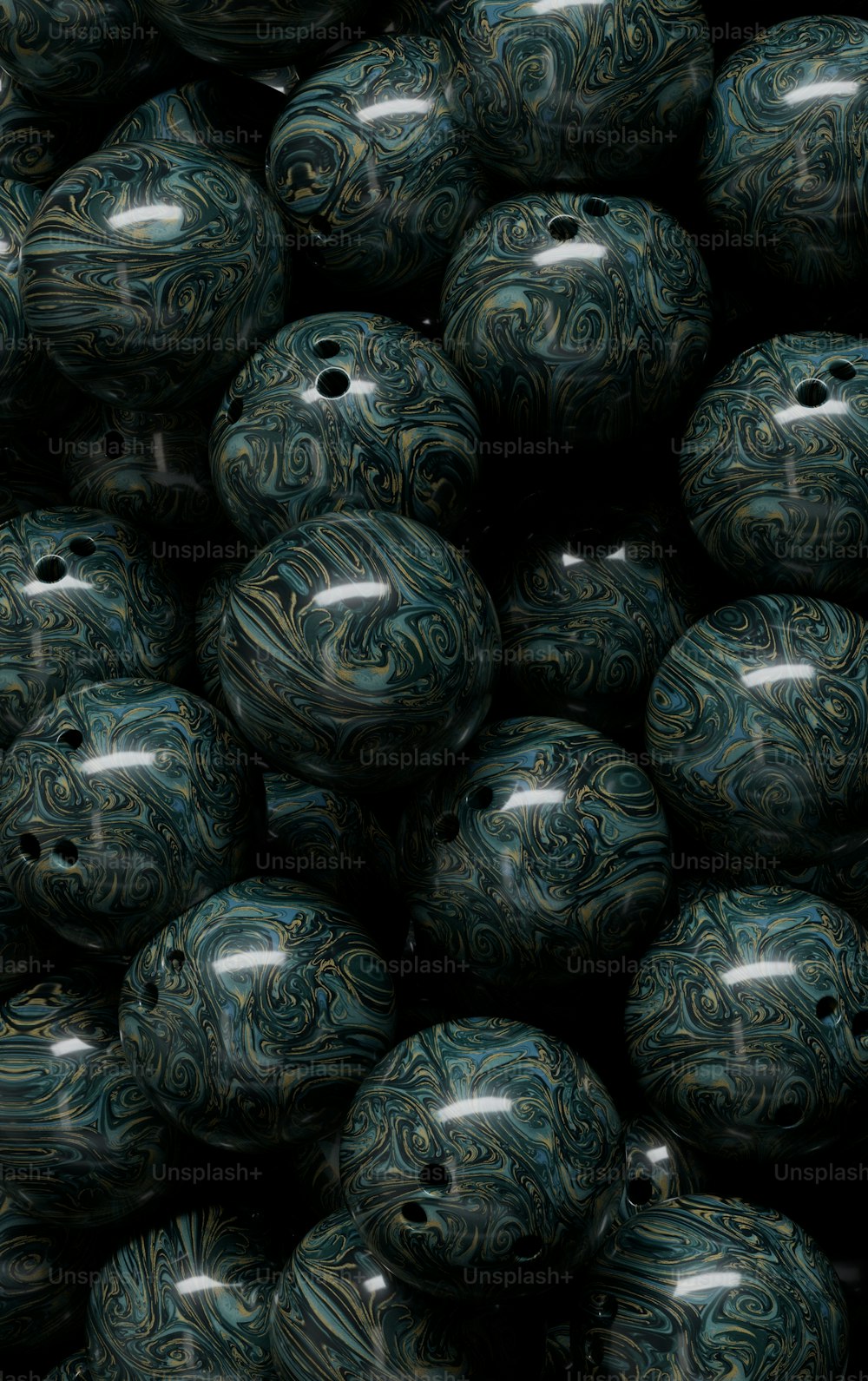 a close up of a bunch of marbled balls