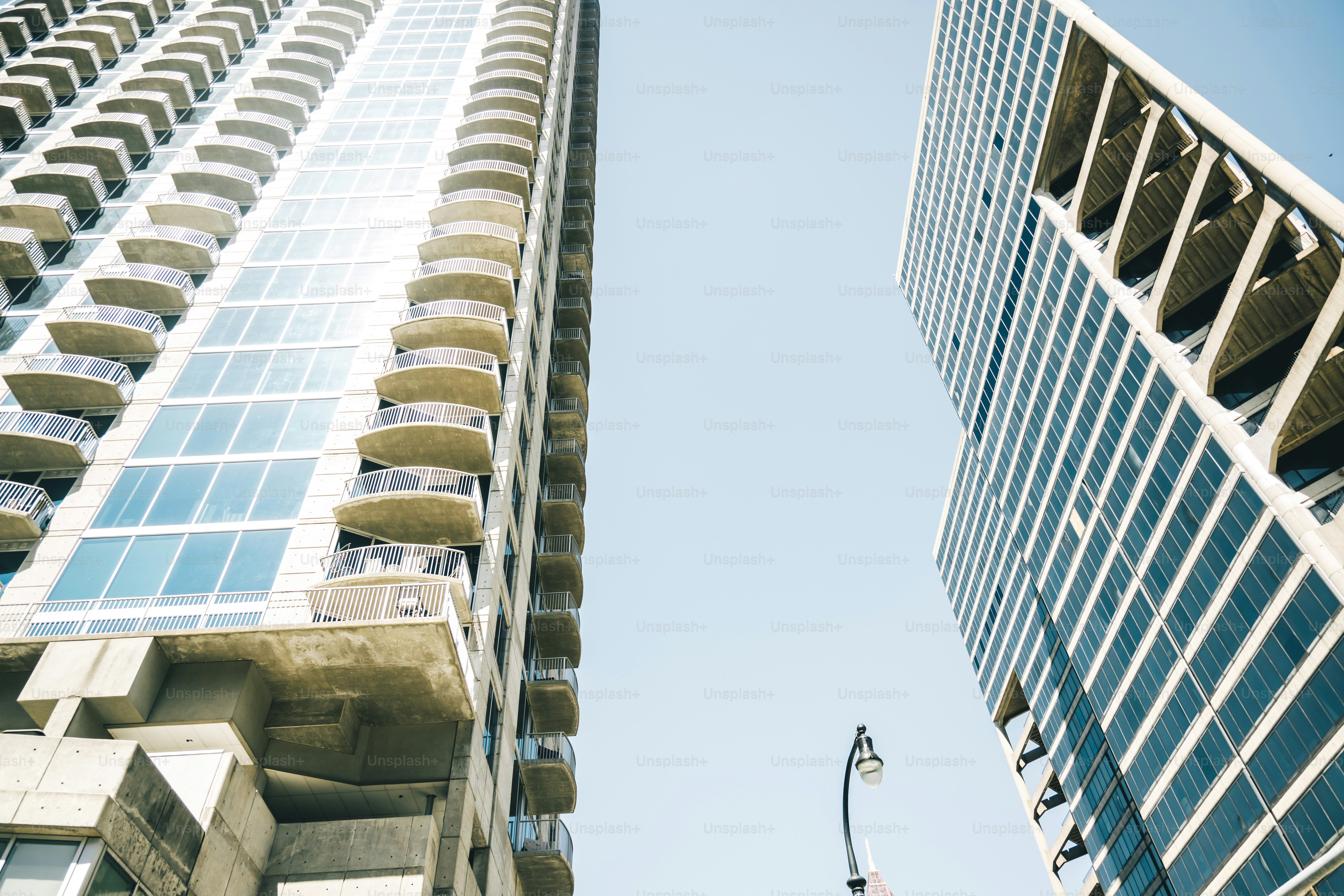 a couple of tall buildings next to each other