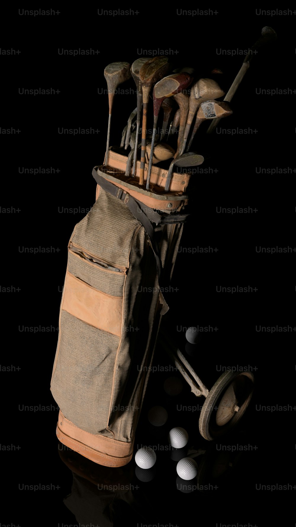 a bag filled with golf clubs sitting on top of a table