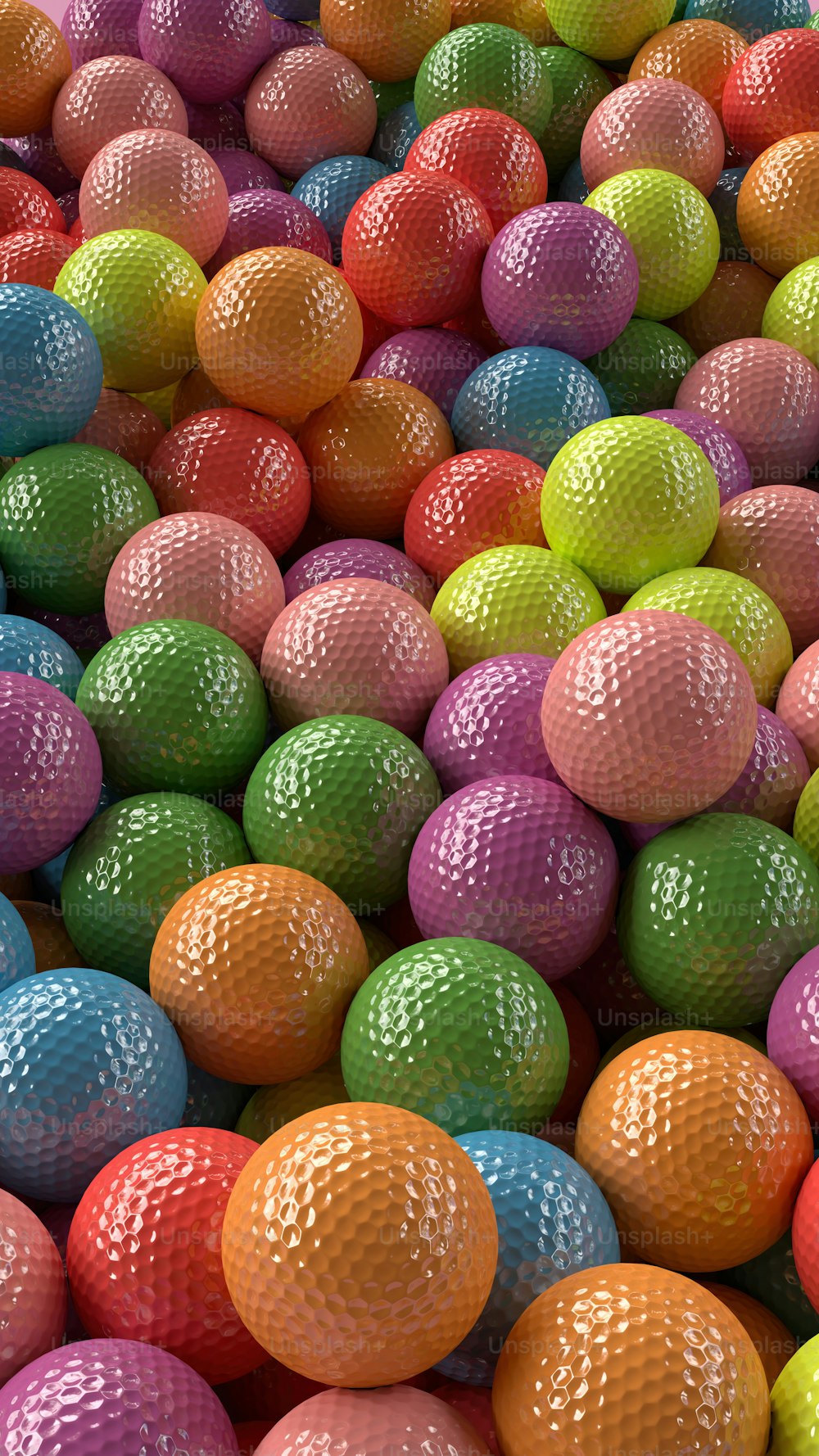 a pile of colorful balls sitting on top of each other