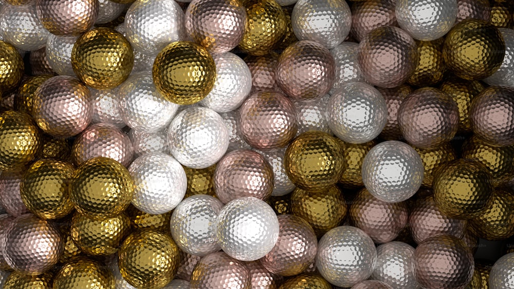 a large pile of shiny metallic balls