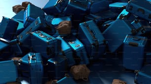 a pile of blue suitcases piled on top of each other