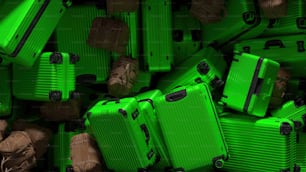 a pile of green suitcases sitting next to each other