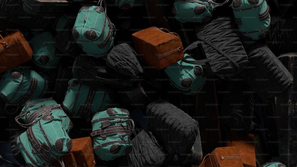 a pile of suitcases sitting next to each other