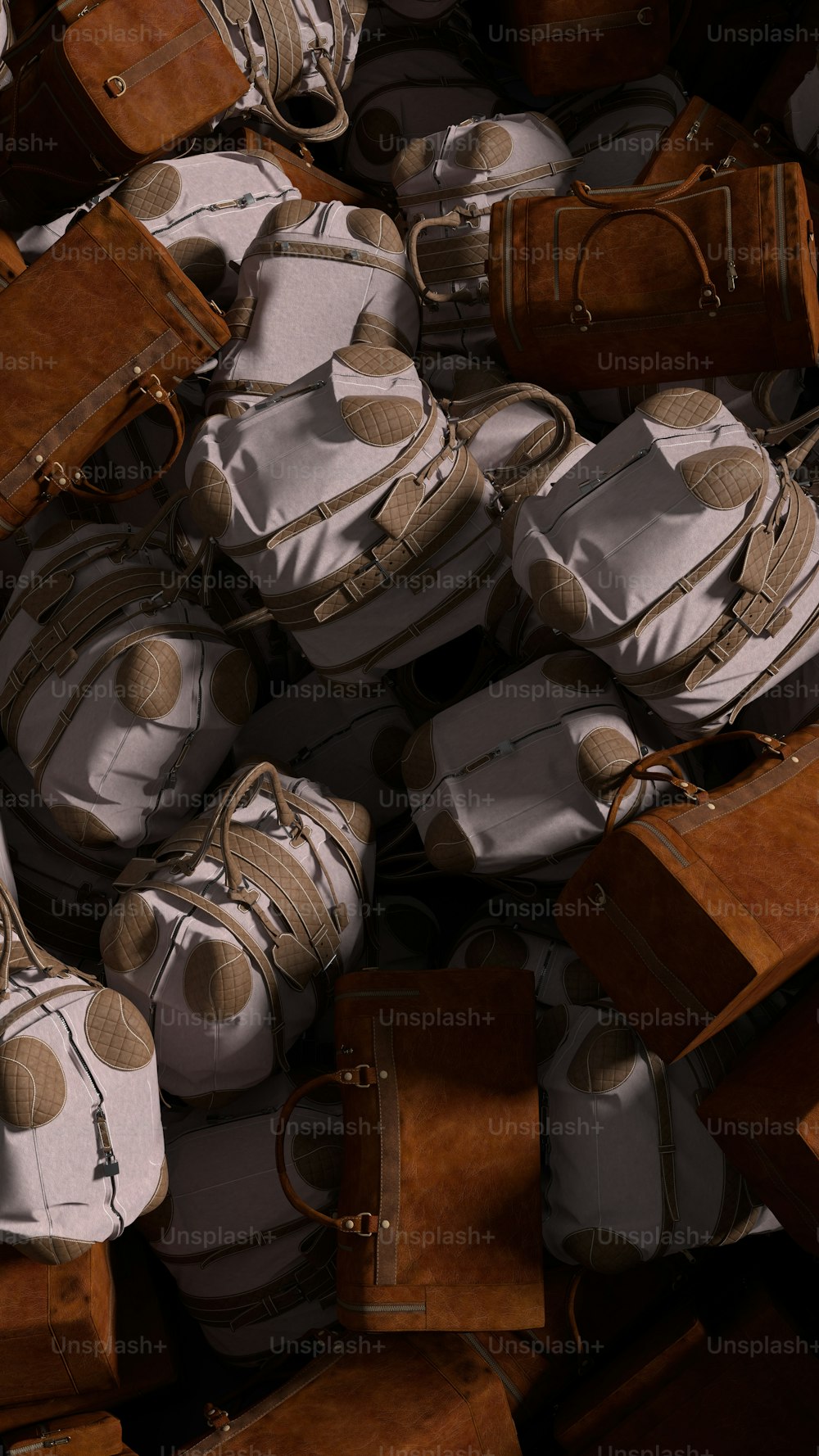 a pile of brown and white bags and suitcases