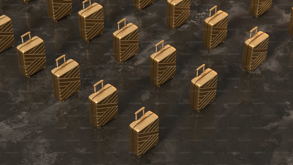 a group of golden suitcases sitting next to each other