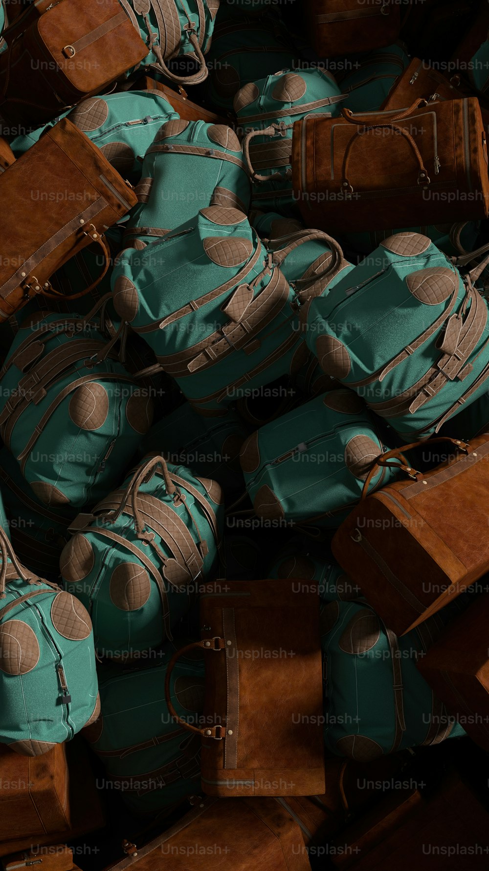 a pile of brown and teal bags and suitcases