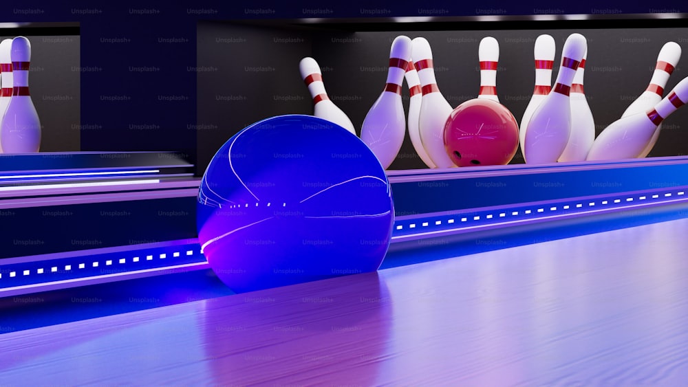 una palla da bowling e un birillo su una pista da bowling
