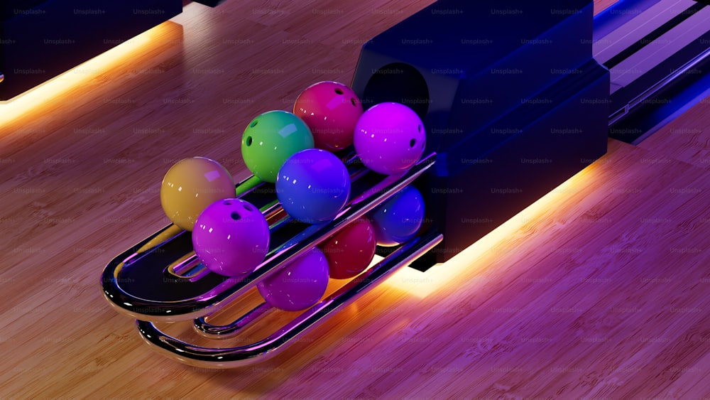 una pista da bowling con palle da bowling in un carrello
