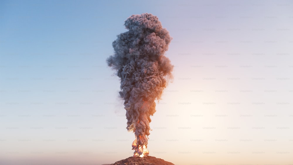 Una gran columna de humo que se eleva desde la cima de una montaña