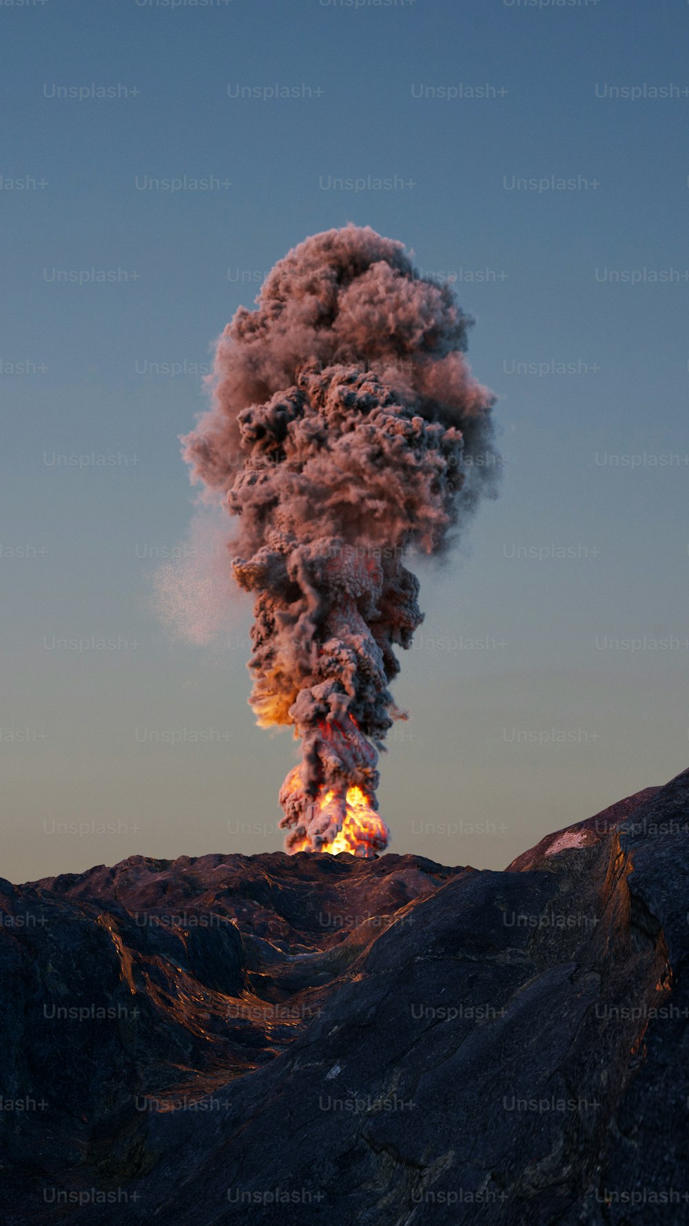 a large plume of smoke billows from the top of a mountain