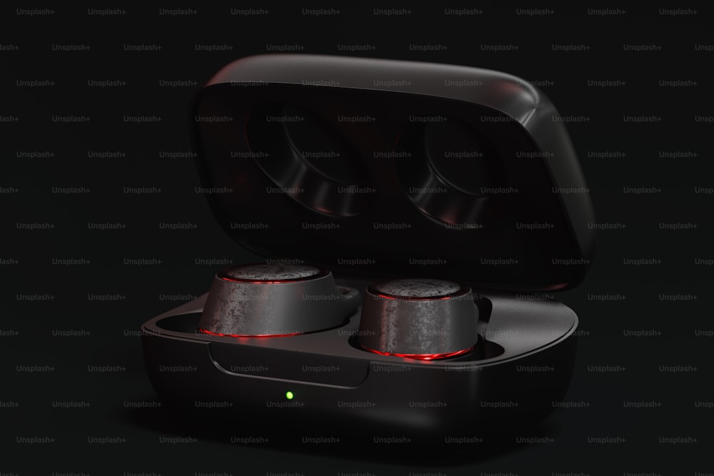 a pair of black earbuds in a case