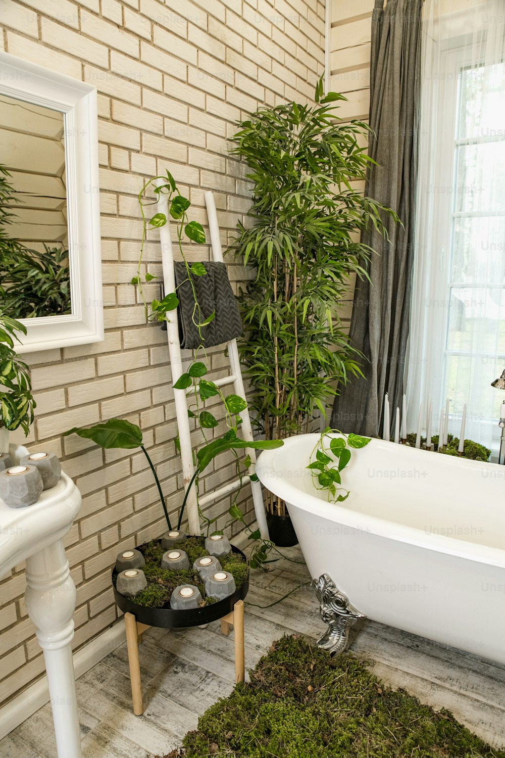 a white bath tub sitting next to a window