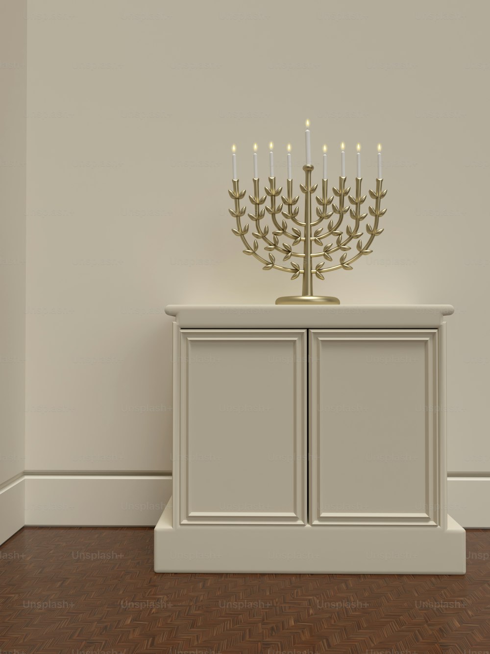 a white cabinet with a lit candle on top of it