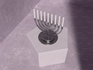 a menorah with eight candles on a stand