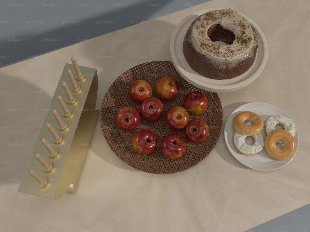 a table topped with donuts and a plate of donuts