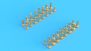 a group of gold chess pieces on a blue background