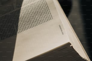 an open book sitting on top of a table